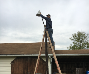 Jacob Kimble, virginia electrician installing outdoor lighting